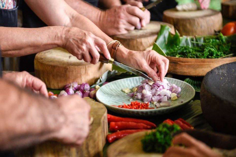 tourists cooking swahili foods